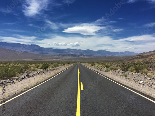 Embark on an unforgettable journey through the stark beauty of Death Valley, California. A mesmerizing desert landscape awaits your exploration photo