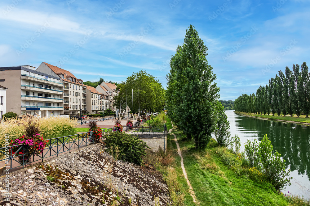 Beautiful view of the banks of the Seine River in the city of. Melun, Seine-et-Marne department, France. Beautiful view of the banks of the Seine River in the city of. Melun, Seine-et-Marne department, France.