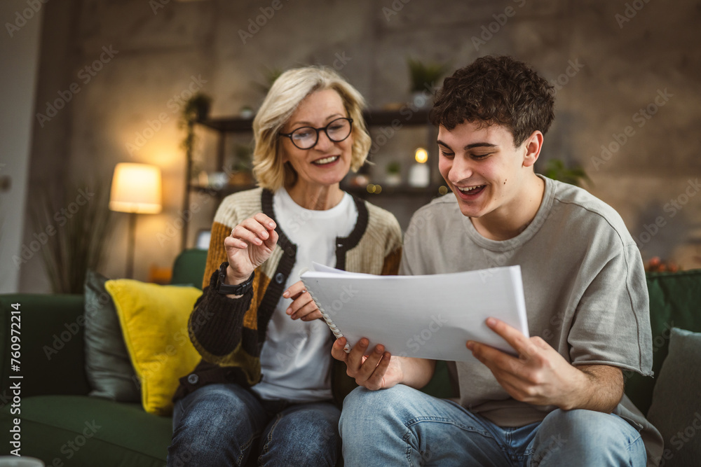 student caucasian man study with help of his tutor professor or mother student caucasian man study with help of his tutor professor or mother