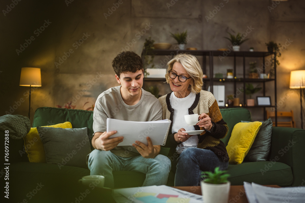 student caucasian man study with help of his tutor professor or mother student caucasian man study with help of his tutor professor or mother