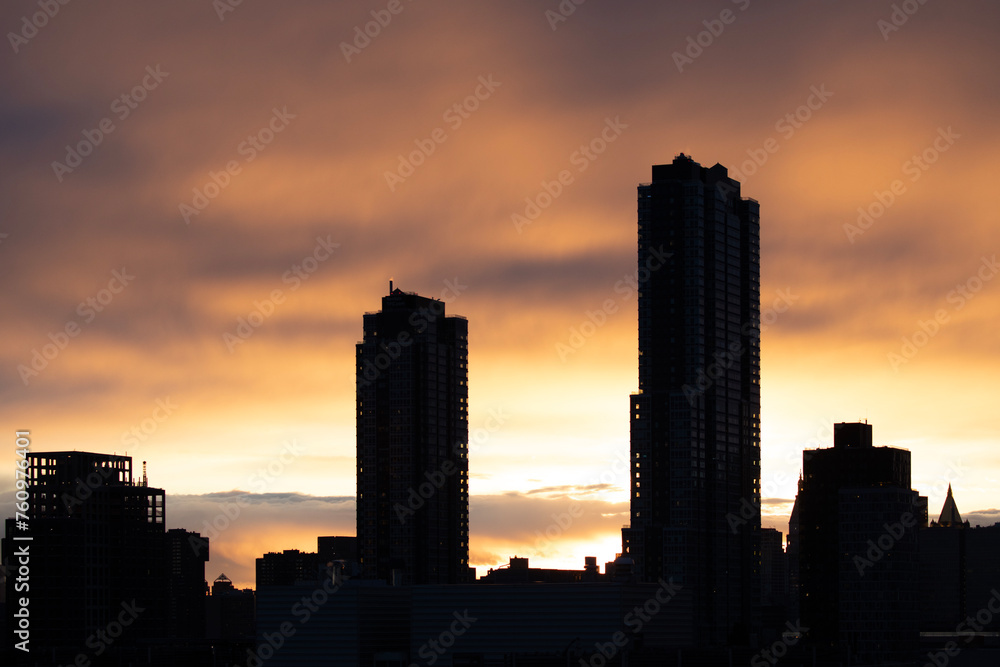 Residential buildings silhouette at sunset 