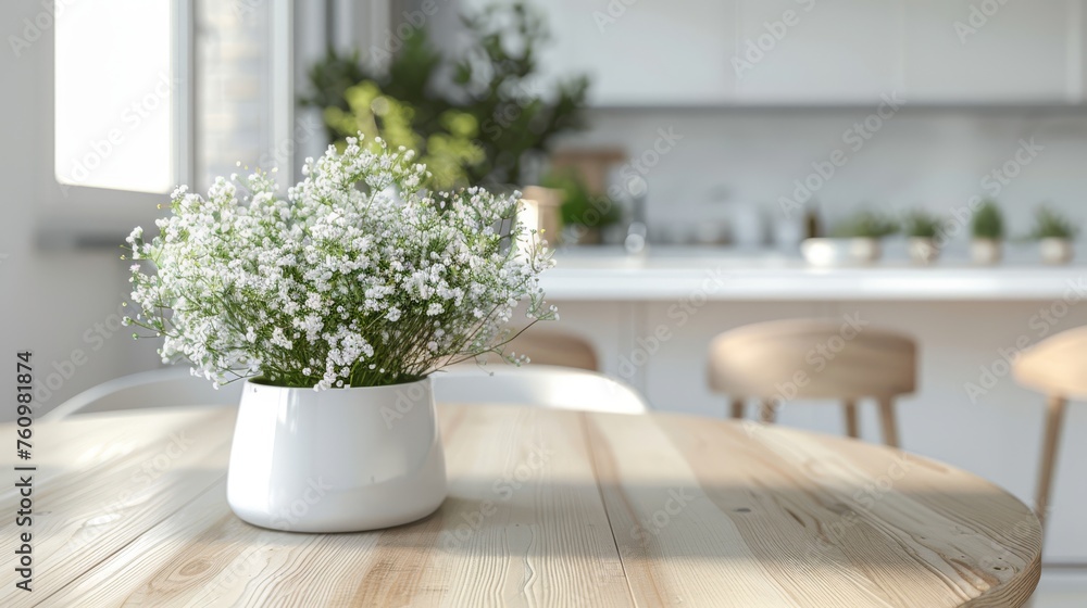 Scandinavian style dining area with gypsophila centerpiece in bright sunlight