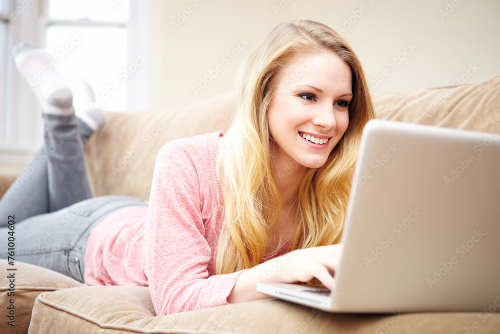 Young Woman with Laptop Computer Lying on Sofa Young Woman with Laptop Computer Lying on Sofa