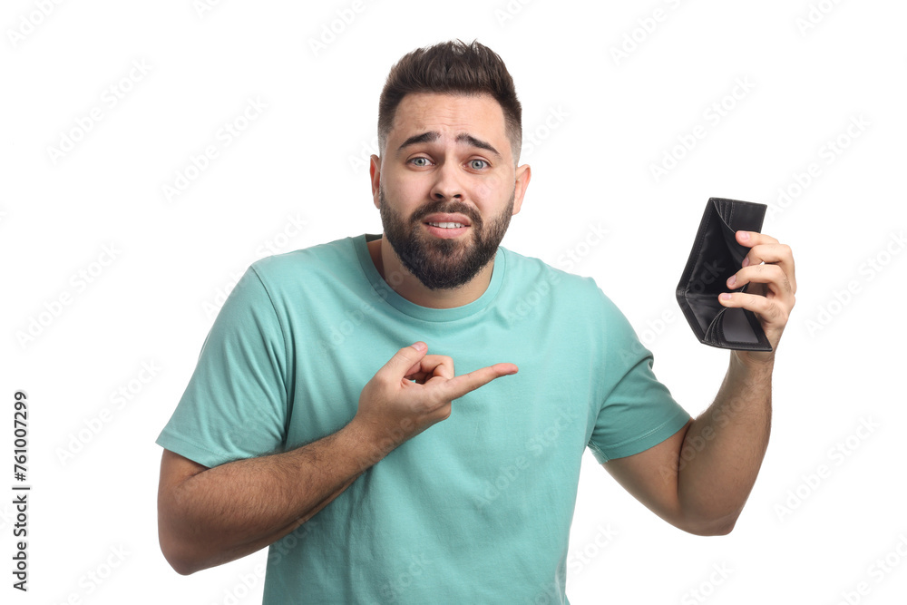 Confused man pointing at empty wallet on white background Confused man pointing at empty wallet on white background