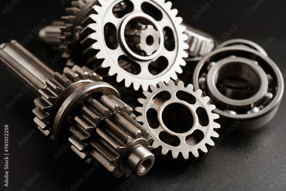 Metal gear wheel engine car and bike, mechanic industry concept. Metal gear wheel engine car and bike, mechanic industry concept.