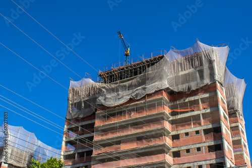 Civil construction site works on a residential building in Brazil. Real estate developments in medium-sized cities have grown every year. #761027883