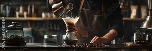 Professional barista making filtered drip coffee in coffee shop..