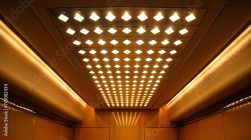 A unique lighting feature in a yacht cabin where small diamondshaped lights are arranged in a gridlike pattern on the ceiling. Each light can be individually controlled allowing