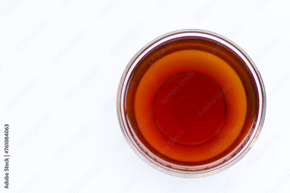 Fish sauce in bowl on white background. Fish sauce in bowl on white background.