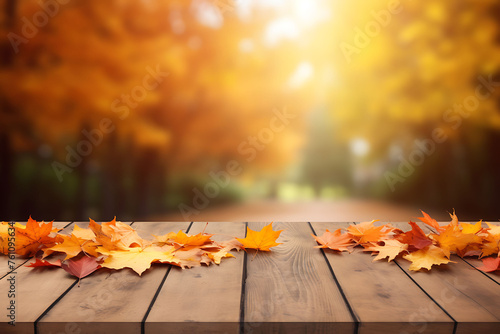 autumn leaves on the wooden table 