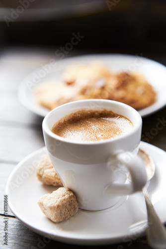 Cup of coffee on rustic wooden background. Copy space.  © Eugeniusz Dudziński