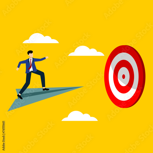 The image of a male actor wearing a suit riding a paper plane towards a dart aim shows an illustration of someone on the road to success, suitable for presentations or posters