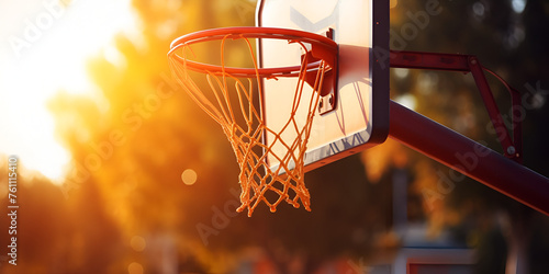 Action shot of basketball falls through basketball hoop and net on nature background, Basketball over basket in stadium at sunset, Generative AI © muzamil