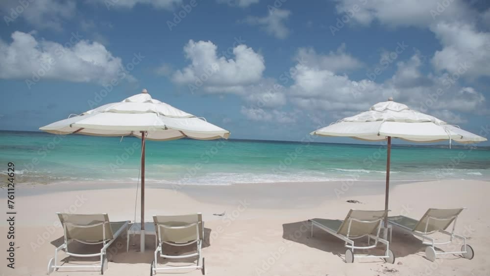 walking pov to Anguilla Caribbean sea white sand tropical paradise island with beach umbrella and chair walking pov to Anguilla Caribbean sea white sand tropical paradise island with beach umbrella and chair