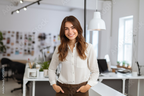 young businesswoman in bright office photo