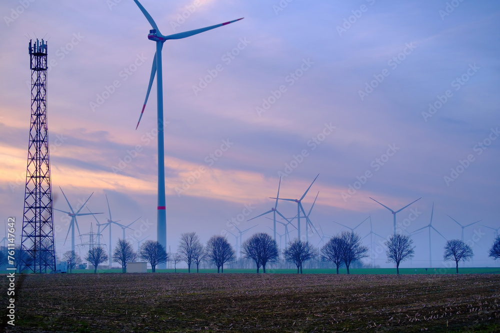 Windmills producing renewable electricity, turbine generator