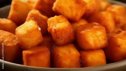 Sweet Potato Surprise Vibrant and naturally sweet, these tater tots are made from deliciously roasted sweet potatoes, offering a healthier alternative without compromising on taste. photo