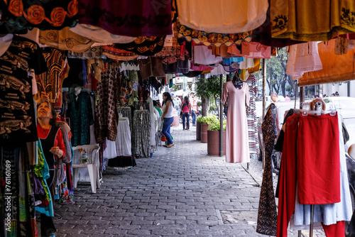Colorful stores at coyoacan market mexico city photo