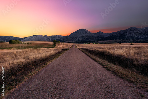 Картината върху платно Colorful sunrise over the Palentina Mountain with the Peña Redonda as the protag