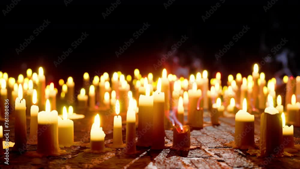 A group of lit candles placed on top of a table, creating a warm and ambient atmosphere. A group of lit candles placed on top of a table, creating a warm and ambient atmosphere.