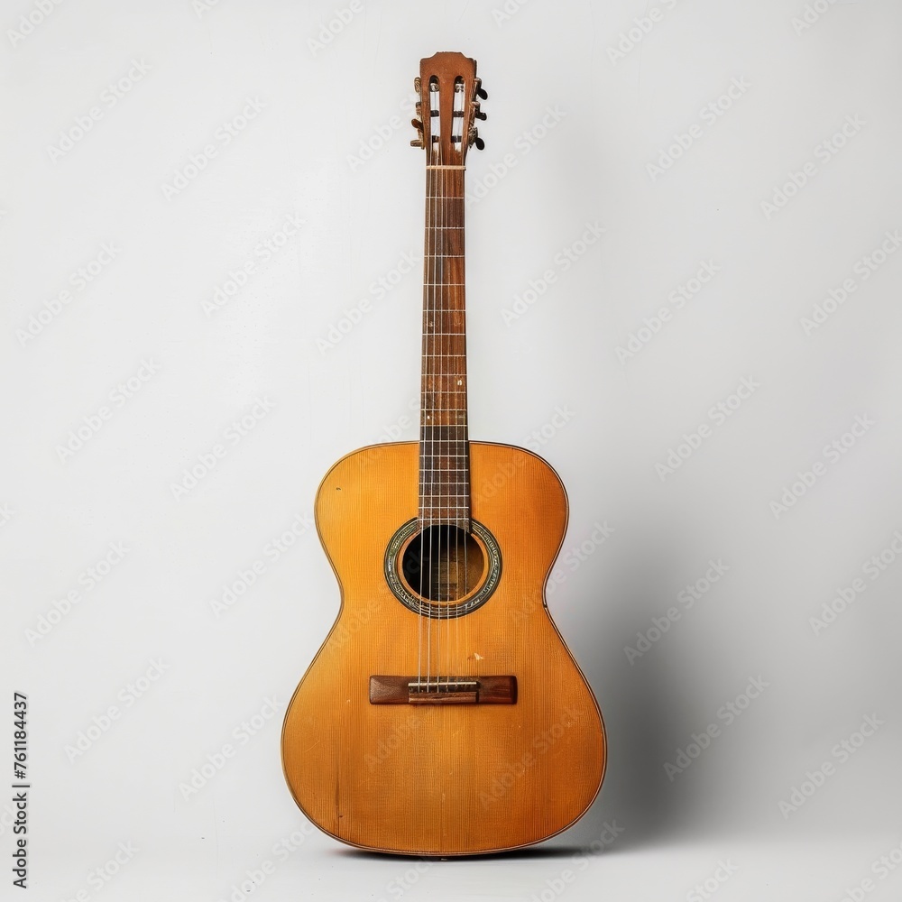 Obraz premium Wooden guitar on a white background.