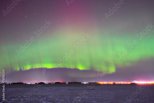 Polar lights over a snow field. © Sergei