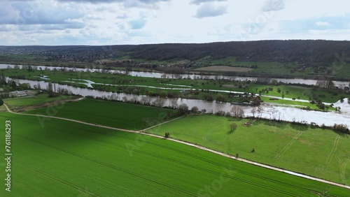 Dampierre sur Avre pond and surrounding country landscape, France. Aerial drone flyback photo