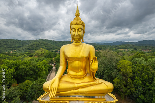 Big Gold Buddha statue at Wat Pha Thang  Uthai Thani  Thailand