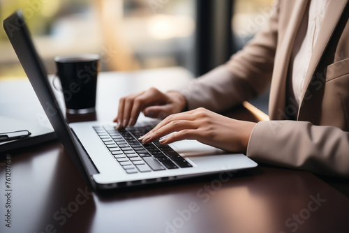 close-up of  hands of businessman pressing on laptop keyboard freelancer technology finance and business