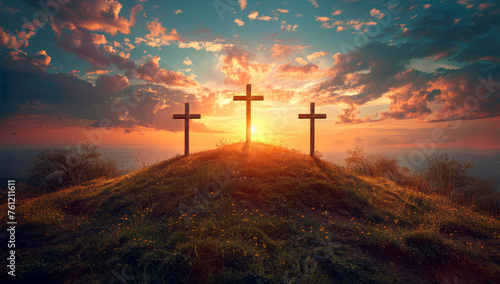 Three wooden crosses on a hill at sunset.