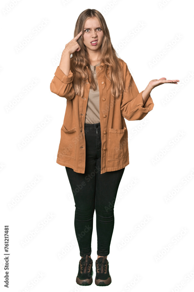 Studio portrait of a blonde Caucasian woman holding and showing a product on hand. Studio portrait of a blonde Caucasian woman holding and showing a product on hand.