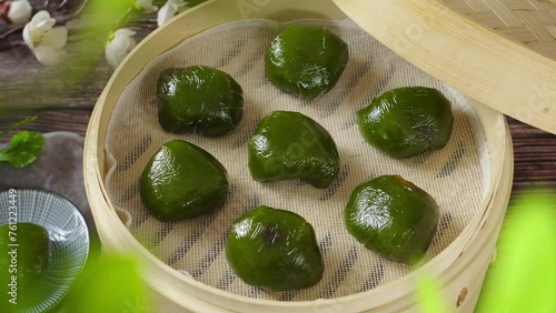 Oriental Chinese Sweet Green Rice Ball,Qingming festival snack. photo