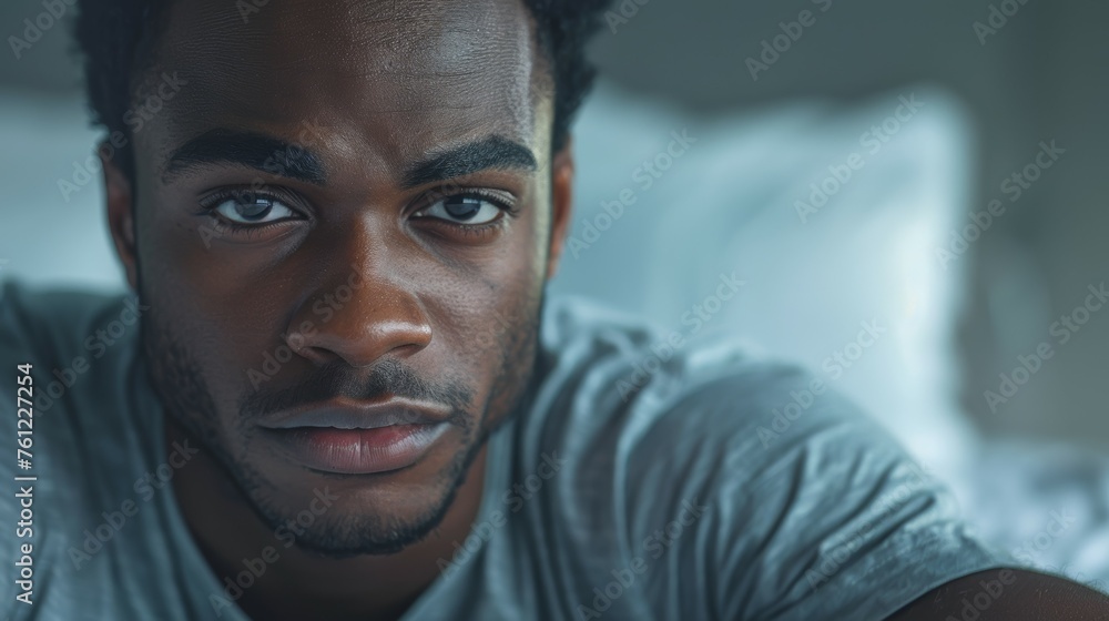 Fototapeta premium Black Man in Bedroom Thinking