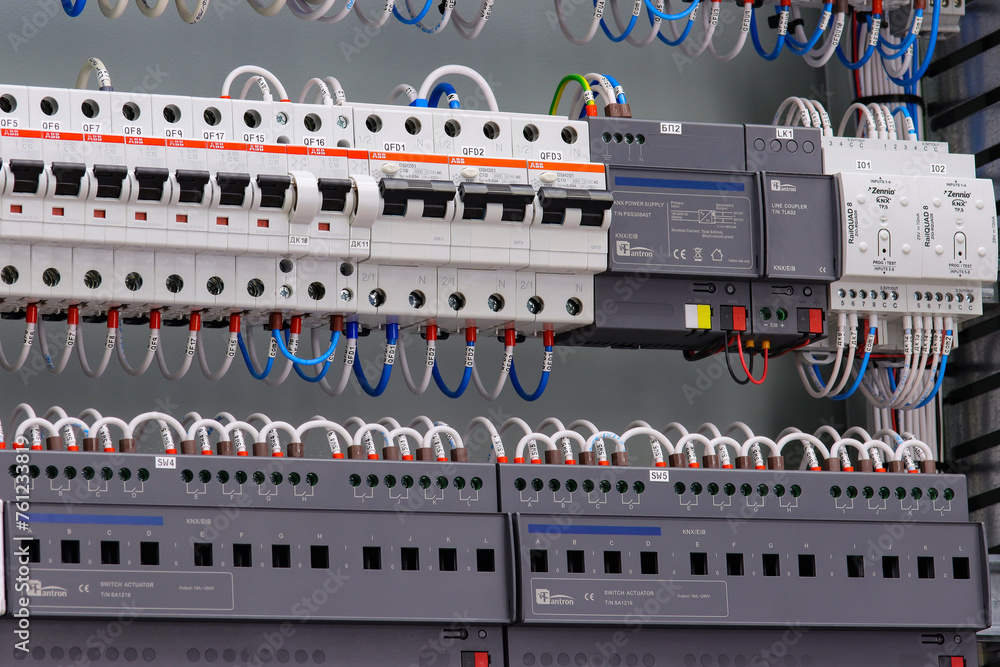 Electronic control modules for apartment automation are installed in an ...