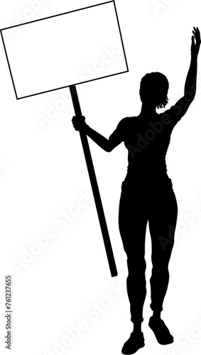 Protestor or demonstrator at a demonstration march, picket line or strike protest rally in silhouette. Holding up a banner or picket sign board placard.