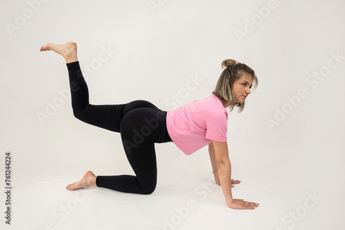attractive woman trainer make stretches exercise isolated