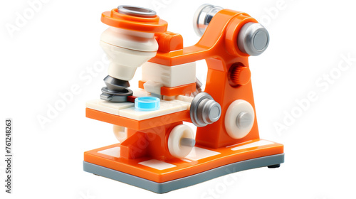 An orange and white toy microscope placed on a white background