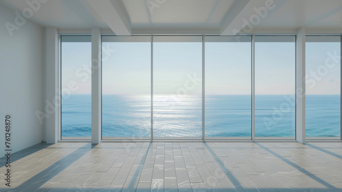 Serene ocean view through a floor-to-ceiling window in a minimalist room.