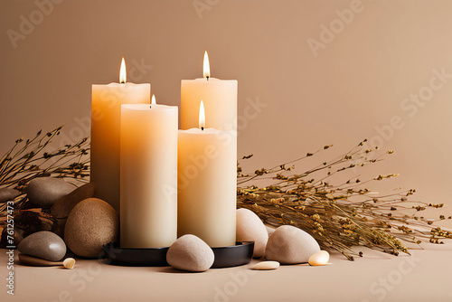 Burning candle on a beige background, creating a warm aesthetic composition with stones and dry flowers, perfect for home decor