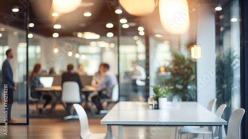 Business office with blurred people. Abstract light bokeh at office interior background for design.