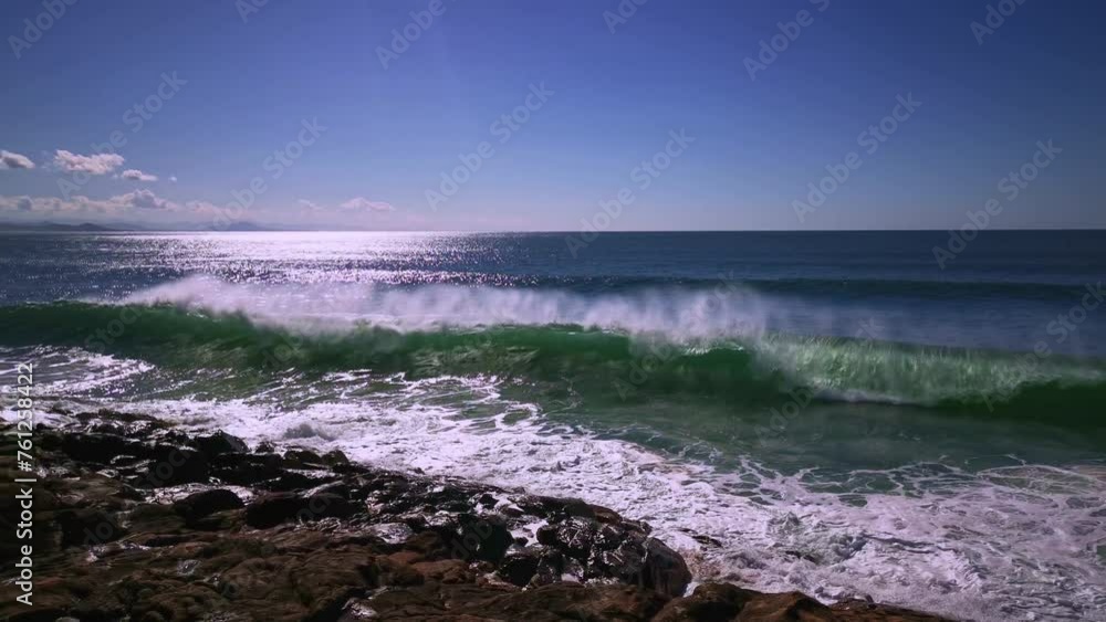 Powerful big pacific ocean wave crashing on ocean floor background. 4K video. Morning sunlight sky. Powerful big pacific ocean wave crashing on ocean floor background. 4K video. Morning sunlight sky.