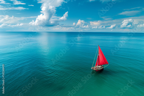 Boat with a red sail