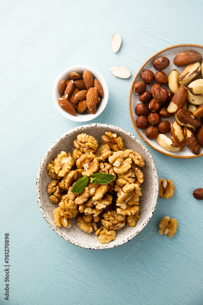 Fototapeta premium Assorted organic nuts on a table