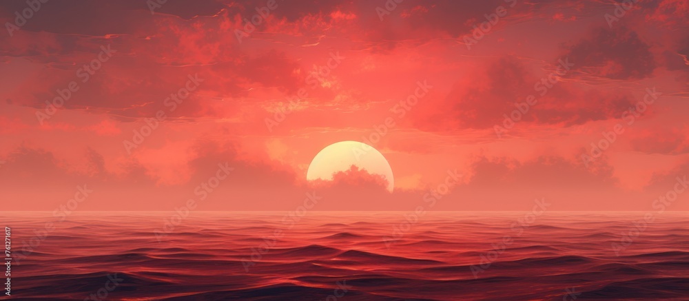 misty mountains against a red,orange sunset sky