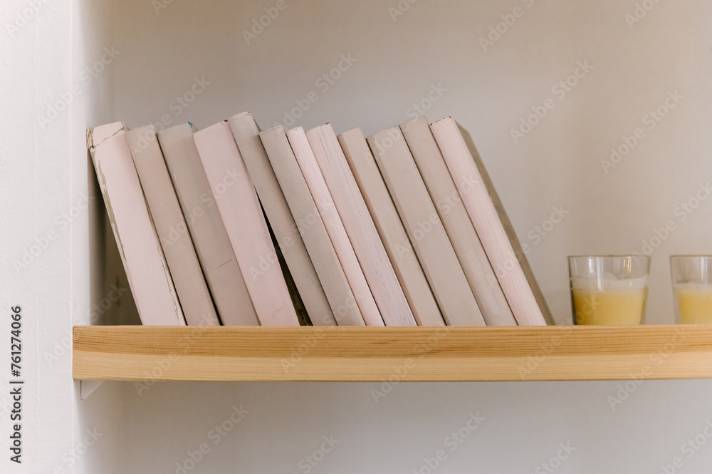 Beautiful minimalistic interior, bookshelf and decor