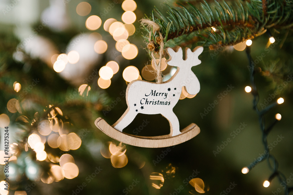 Beautiful handmade Christmas toys on the Christmas tree close-up