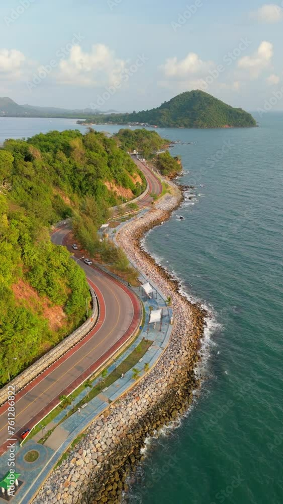 The seaside road at Khung Wiman Bay in eastern Thailand. road landscape in summer. it's nice to drive on the beachside highway. Chantaburi Province Thailand The seaside road at Khung Wiman Bay in eastern Thailand. road landscape in summer. it's nice to drive on the beachside highway. Chantaburi Province Thailand