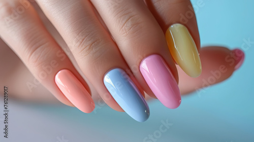 Pastel Nail Polish on Elegant Female Fingers