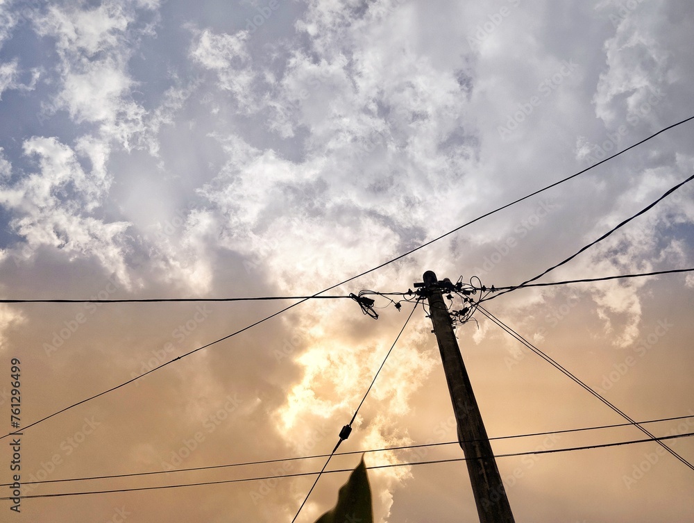 Silhouette of electric pole under the sky Silhouette of electric pole under the sky