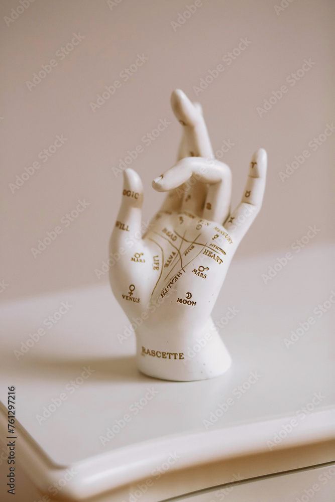 Close up photo of plaster limb female hand with palm reading map, palmistry. Astrology concept. Space for text Close up photo of plaster limb female hand with palm reading map, palmistry. Astrology concept. Space for text